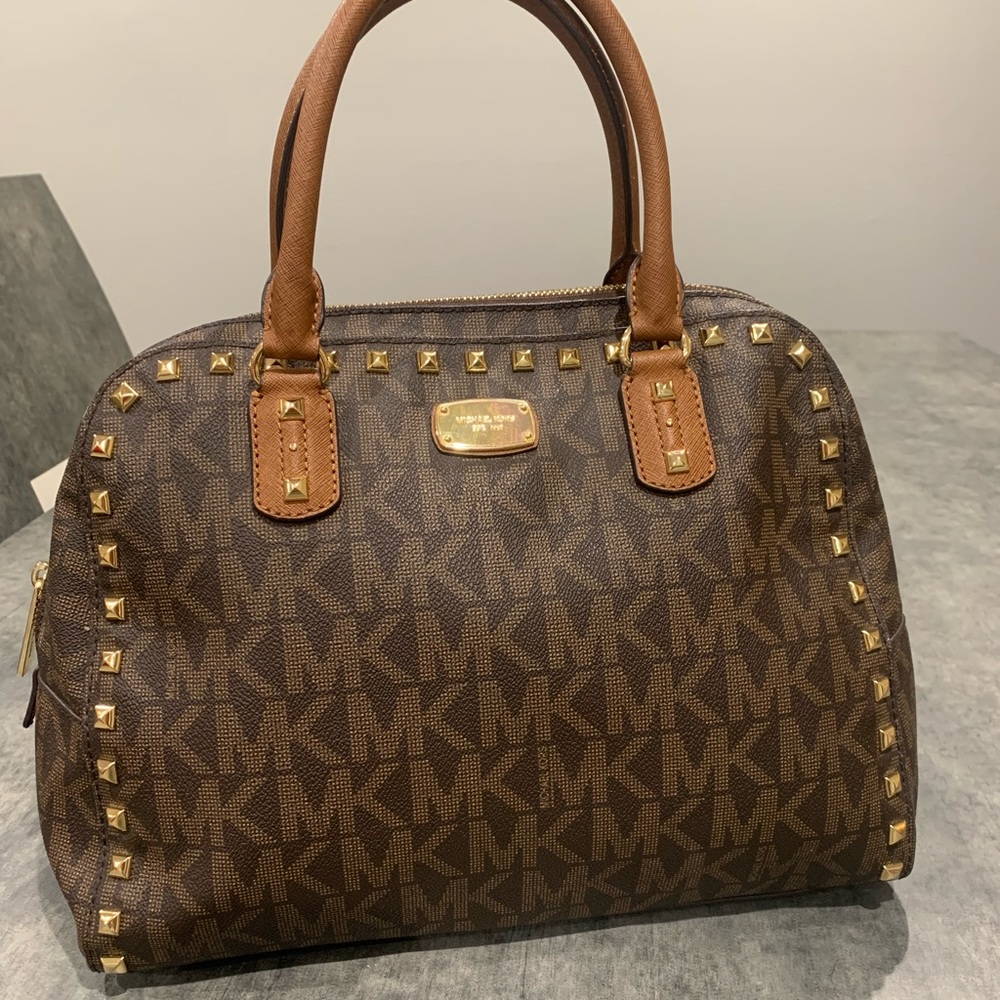 Michael Kors logo printed bag. One time used